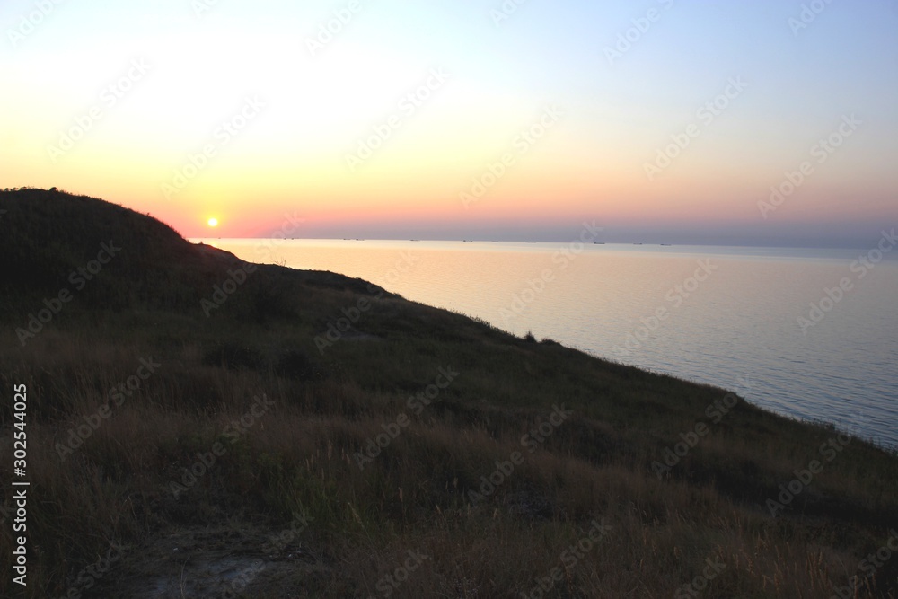 boat at sunset / sea / Crimean bridge / Black Sea? sunset
