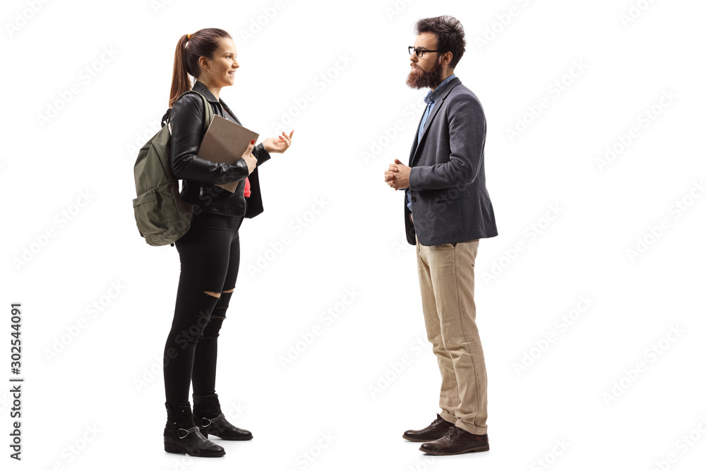 Girl with a backpack and a book talking to a bearded man Girl with a backpack and a book talking to a bearded man