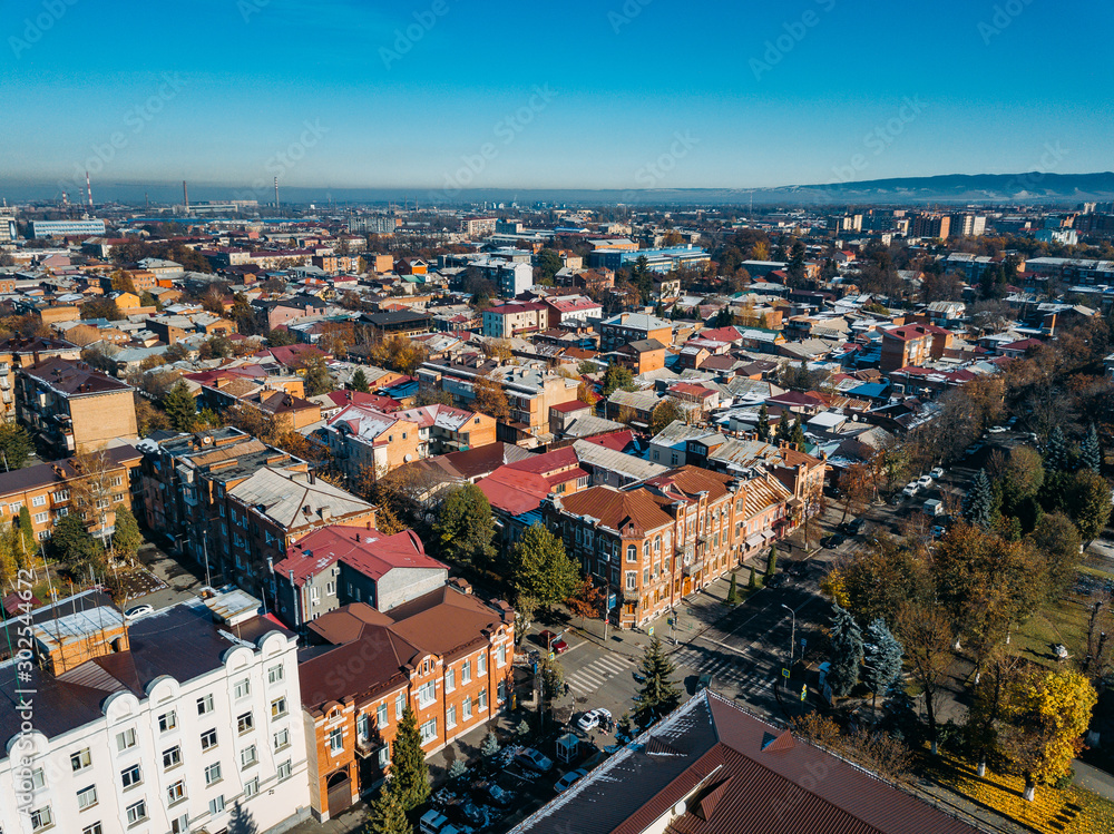 Vladikavkaz, capital of North Ossetia. Panorama of historical downtown from drone flight