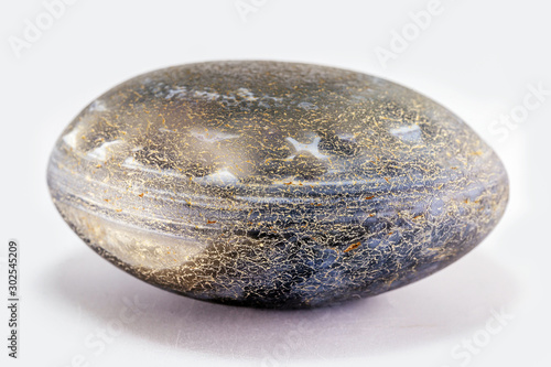 Stone Cairn on White Striped Gray Background, Five Stones Tower, Simple Balance Stones, Simplicity Harmony and Balance, Zen Rock Sculptures. White background and space for text.