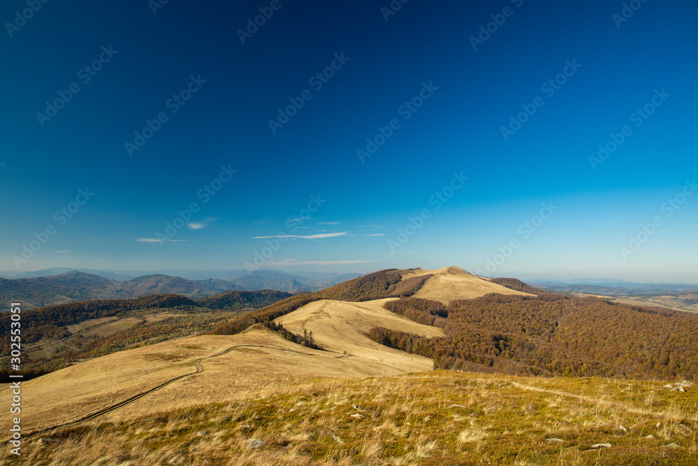 mountain ridge aerial landscape top view photography in clear weather day time and blue sky background 