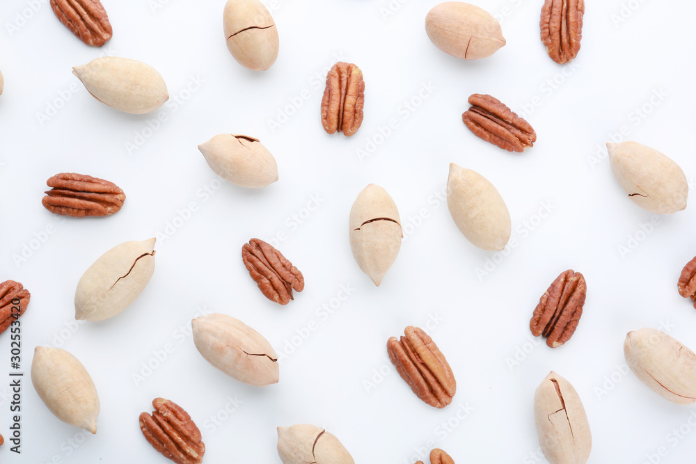 Tasty pecan nuts on white background Tasty pecan nuts on white background