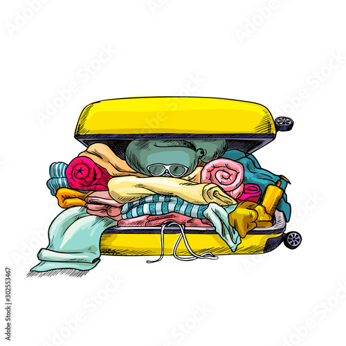 Yellow suitcase, overloaded, opened, full of stuff