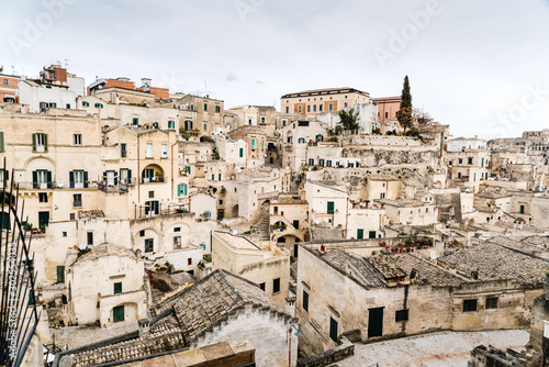 Long panoramic views of the rocky old town of Matera with its stone roofs. © Joaquin Corbalan