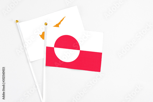 Greenland and Cyprus stick flags on white background. High quality fabric, miniature national flag. Peaceful global concept.White floor for copy space. Free Download Greenland and Cyprus stick flags on white background. High quality fabric, miniature national flag. Peaceful global concept.White floor for copy space. - GFXLoad