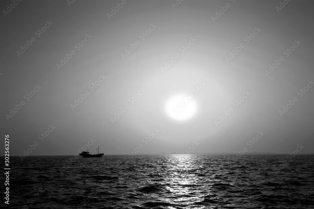 The fishing boats docked at the sea The fishing boats docked at the sea