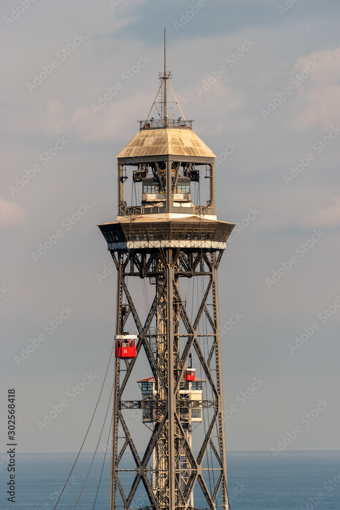 The Port Vell Aerial Tramway is an aerial tramway in Barcelona, Catalonia,  Spain. It crosses Port Vell, Barcelona's old harbour, connecting the  Montjuïc hill with the seaside suburb of Barceloneta Stock Photo