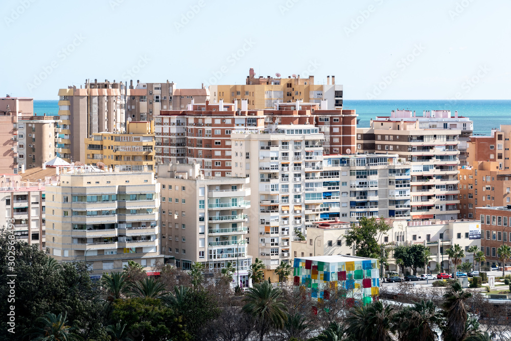 The skyline of Malaga, Spain near  La Malagueta beach and the port