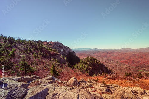 Grandfather Mountain State park in fall season. Grandfather Mountain is a mountain near Linville, North Carolina. At 5,946 feet, it is the highest peak on the eastern of the Blue Ridge Mountains. photo