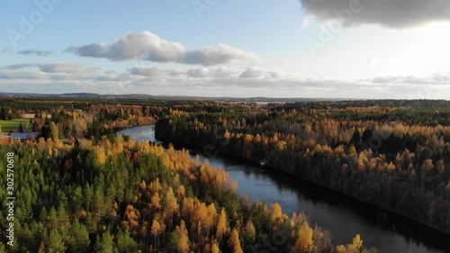 Autumn landscape with river and forest
