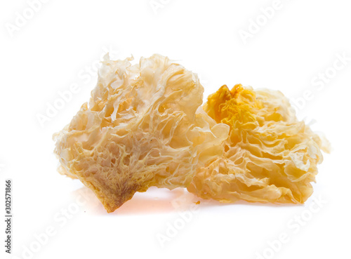White jelly fungus, snow fungus, traditional chinese herbal medicine isolated on white background