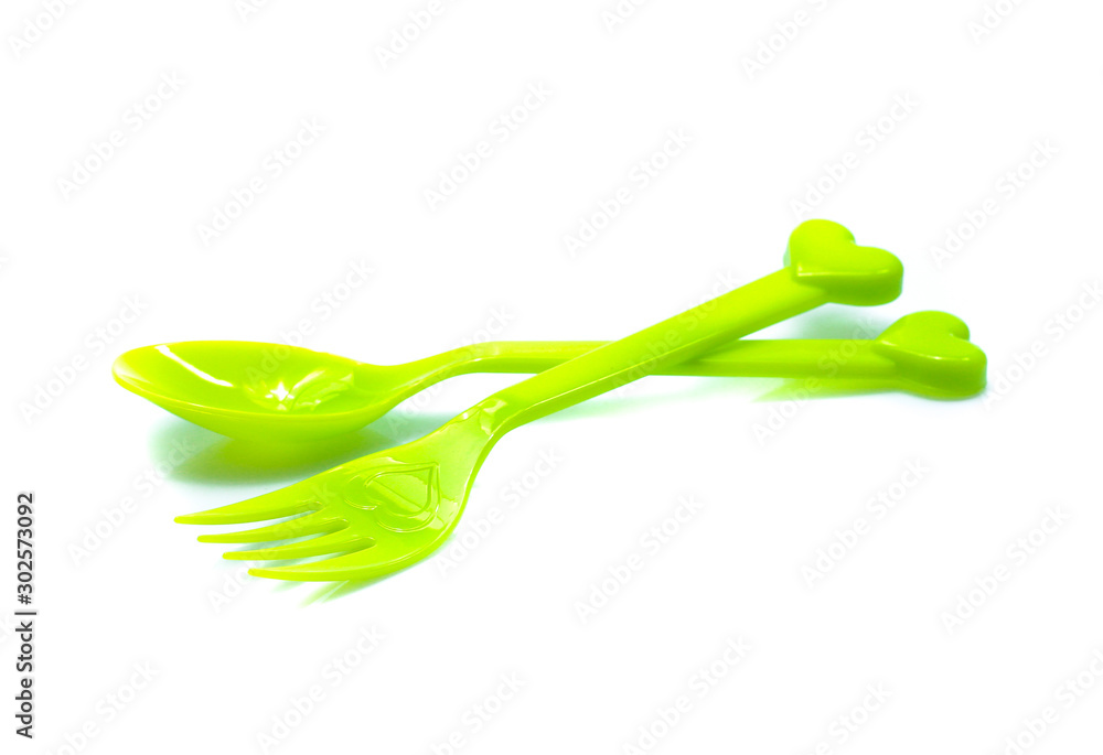 plastic fork, spoon isolated on white backgruond plastic fork, spoon isolated on white backgruond