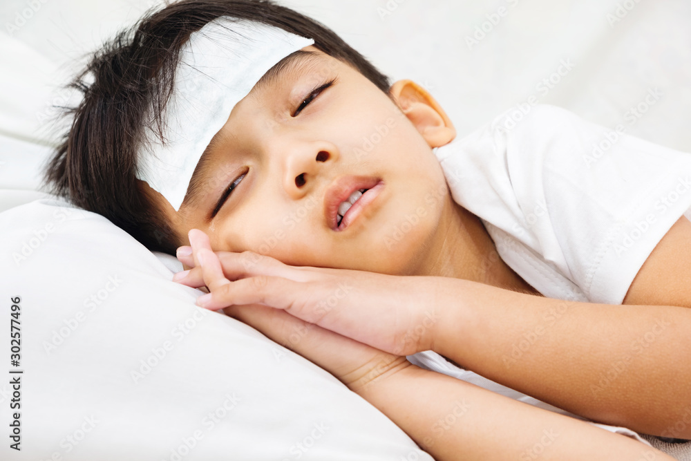 Asian boy is not comfortable. Asian boy is not comfortable.