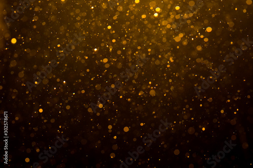 Abstract gold bokeh with black
