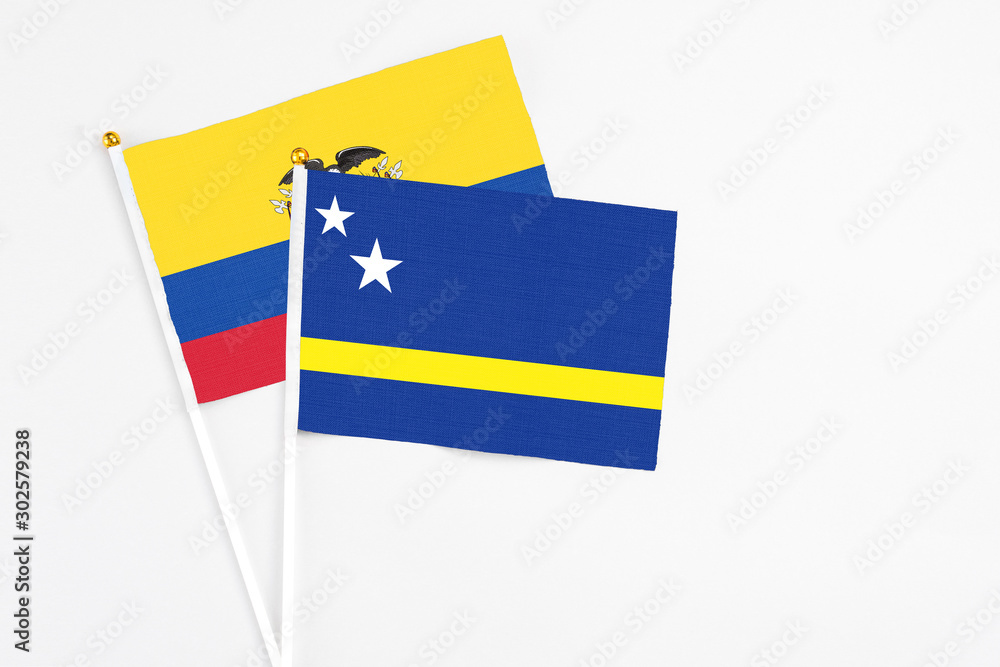 Curacao and Ecuador stick flags on white background. High quality fabric, miniature national flag. Peaceful global concept.White floor for copy space. Curacao and Ecuador stick flags on white background. High quality fabric, miniature national flag. Peaceful global concept.White floor for copy space.