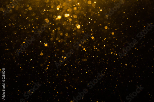 Abstract gold bokeh with black