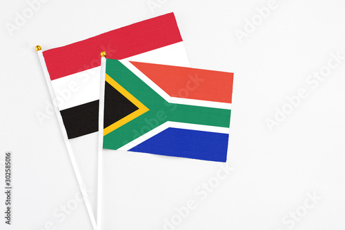 Free Download South Africa and Egypt stick flags on white background. High quality fabric, miniature national flag. Peaceful global concept.White floor for copy space. - GFXLoad