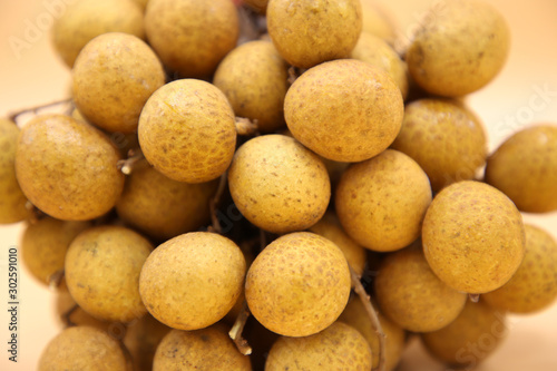 longan fresh fruit of Thailand on yellow background