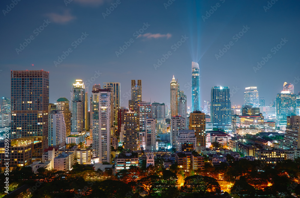 Cityscape night view of Bangkok modern office business building