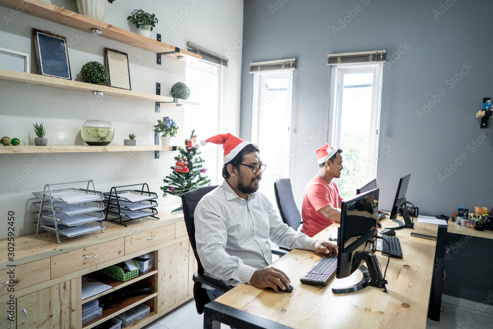 portrait of asian worker team working in the office during christmas season portrait of asian worker team working in the office during christmas season