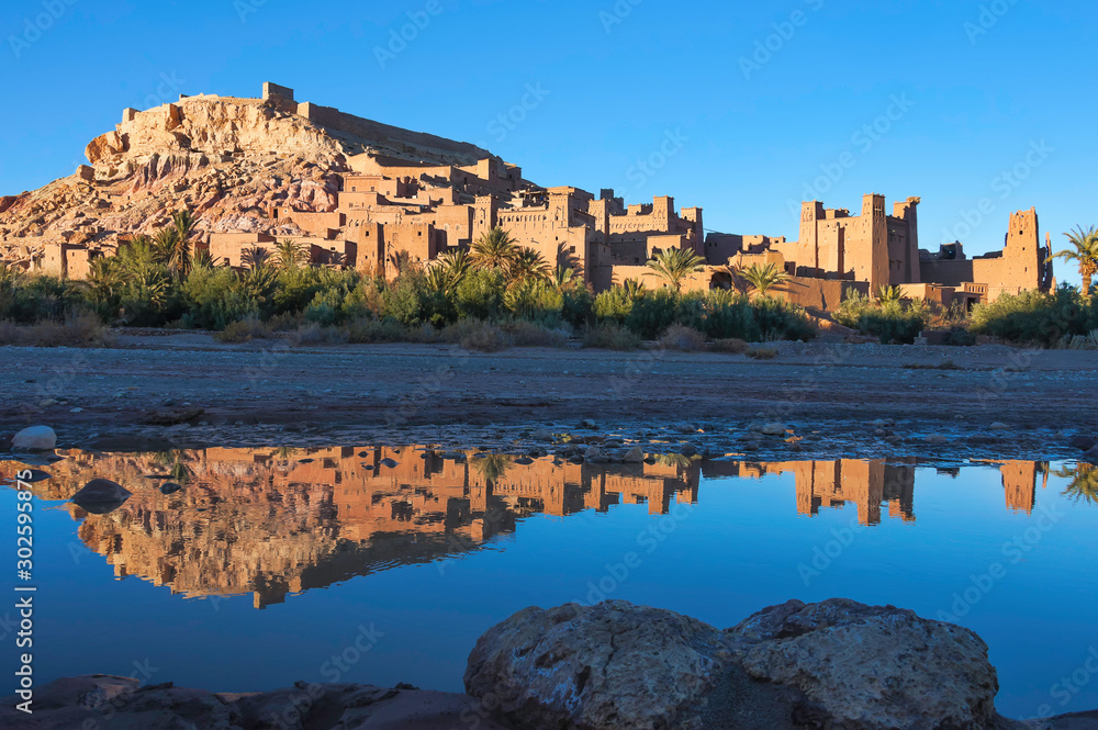 Kasbah Ait Ben Haddou with reflection in the river.