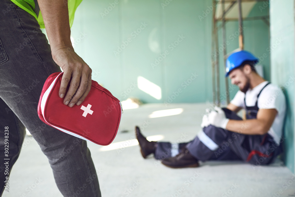 Construction worker accident with a construction worker. - obrazy, fototapety, plakaty 