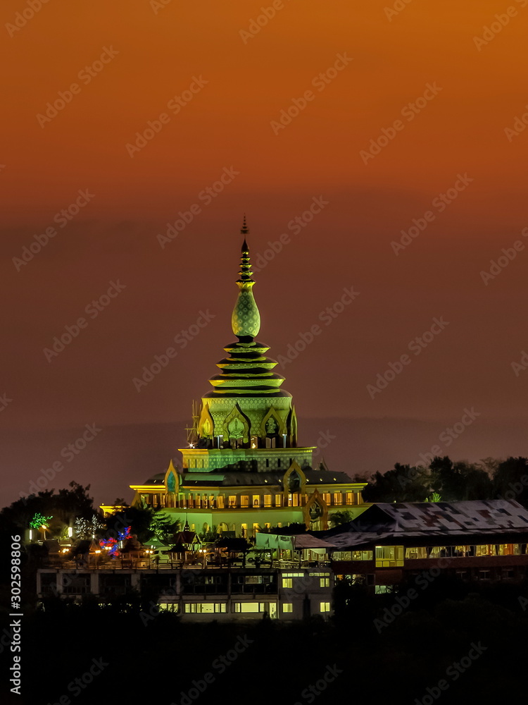 view evening of Crystal Pagoda or Chedi Kaew with red sky background, twilight at Wat Tha Ton, Tha Ton, Fang, Chiang Mai, northern of Thailand.
