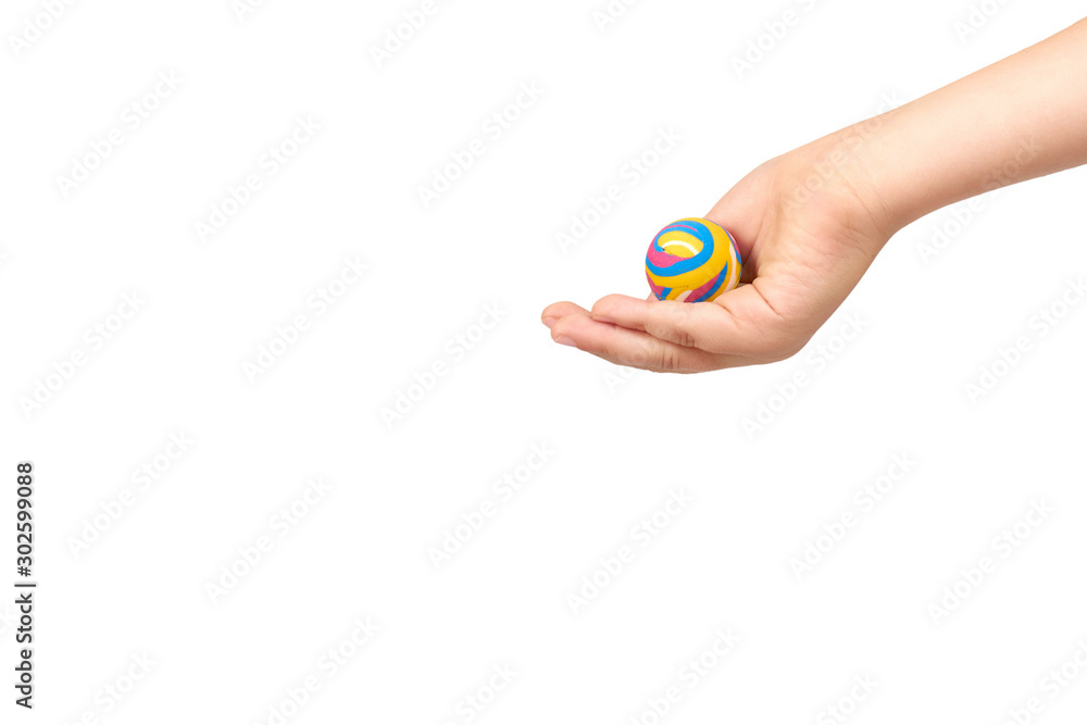 Children hand with color rubber ball, kids educational toy. Children hand with color rubber ball, kids educational toy.
