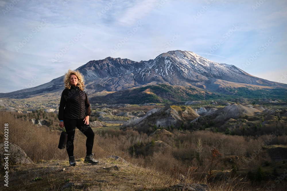 Woman hiking  in Mt St Helens National Volcanic Monument.  Travel Washington State.  United States of America