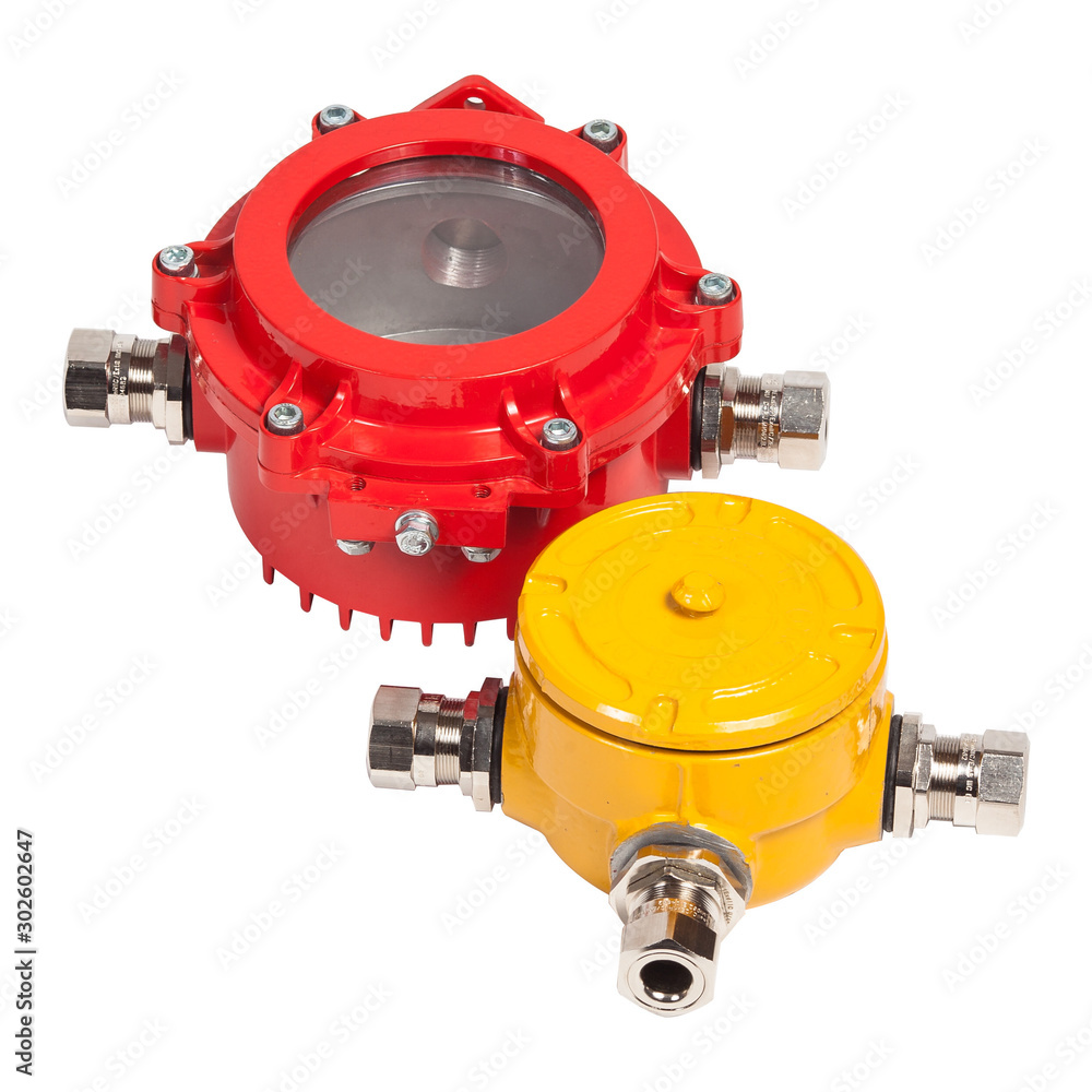 Set of red and yellow metal junction box for wiring isolated on white background.