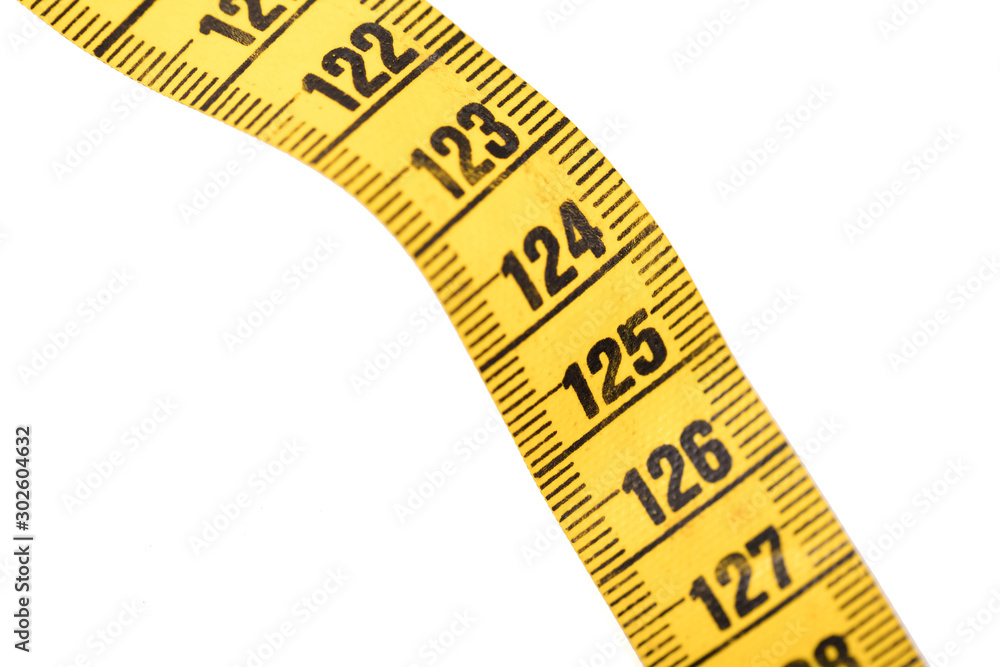 Close-up of a yellow measuring tape isolated on white - 125 Close-up of a yellow measuring tape isolated on white - 125