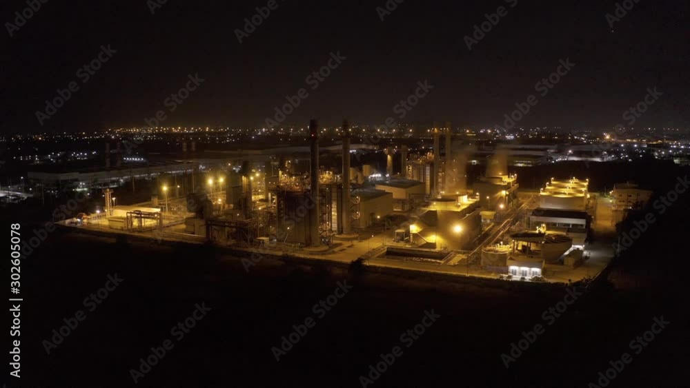 Aerial view oil terminal is industrial facility for storage of oil and petrochemical. oil manufacturing products ready for transport and business transportation. power electric plant. Aerial view oil terminal is industrial facility for storage of oil and petrochemical. oil manufacturing products ready for transport and business transportation. power electric plant.
