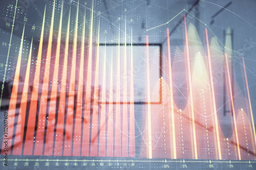 Stock market chart with trading desk bank office interior on background. Double exposure. Concept of financial analysis © Andrey