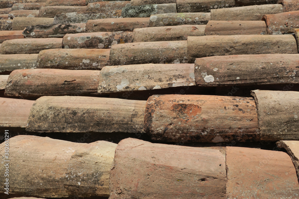 roof of terracotta roof tiles on a roof in Bolsena Italy roof of terracotta roof tiles on a roof in Bolsena Italy