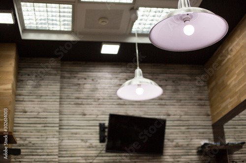 stylish lights on the ceiling of the Barber shop. shallow depth of field, selective focus