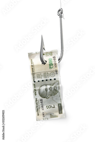 Indian currency note Rs. 500 bill and fishing hook on a white background. The concept of cash transactions - 3D illustration