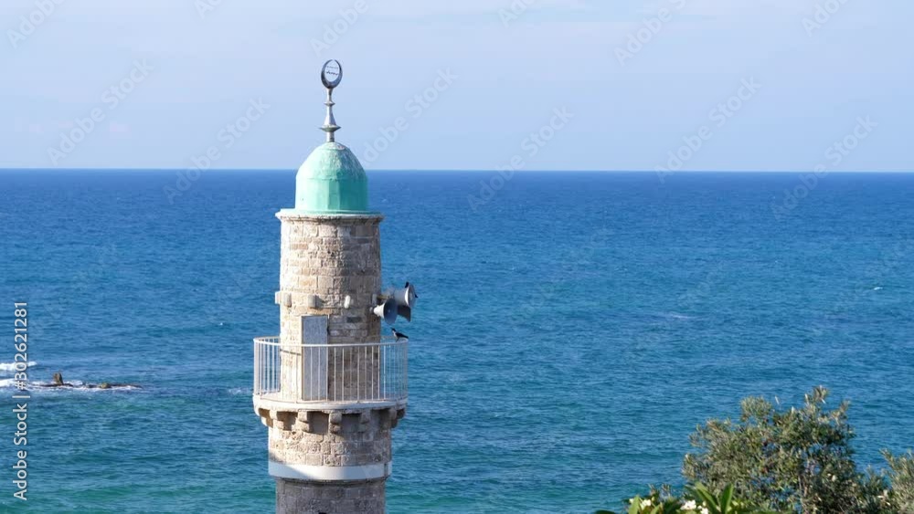 Al Bahr mosque minaret against the blue sea. Jaffa. Static Al Bahr mosque minaret against the blue sea. Jaffa. Static