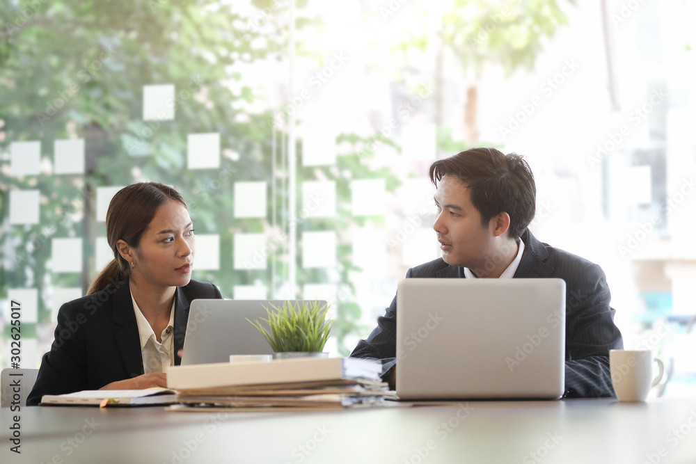 Business working in office with documents and laptop people Consulting and business planning. Business working in office with documents and laptop people Consulting and business planning.