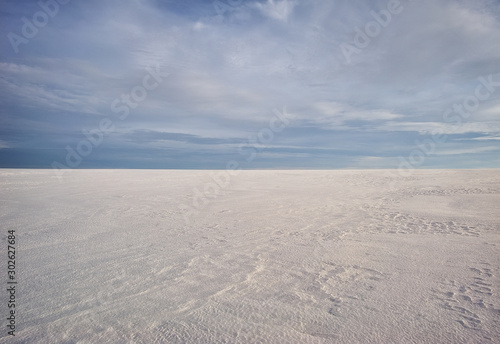 winter field. picturesque sunset in a snowy field