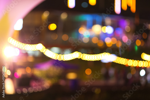 Obraz na plátne Abstract blur multi-color bogey and light at night background.
