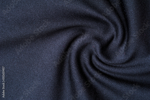 Fragment of crumpled gray polyester wear