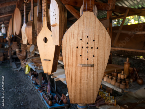 TBILISI, GEORGIA - JULY 14, 2019: The panduri is a traditional Georgian three-string plucked instrument for sale