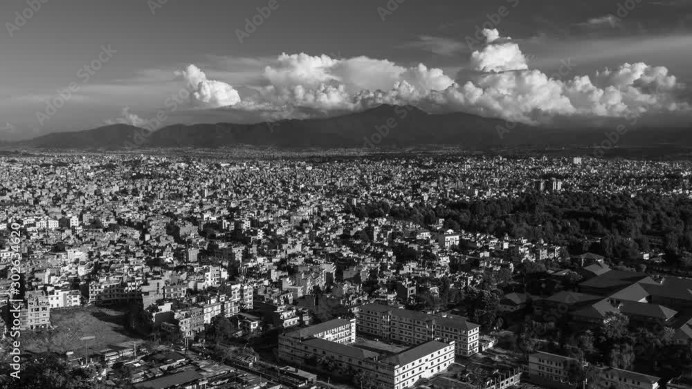 Kathmandu Cityscape, Aerial Time-lapse. Nepal Capital Timelapse at Sunrise. Sky and Skyline from Monkey Temple. black and white Kathmandu Cityscape, Aerial Time-lapse. Nepal Capital Timelapse at Sunrise. Sky and Skyline from Monkey Temple. black and white