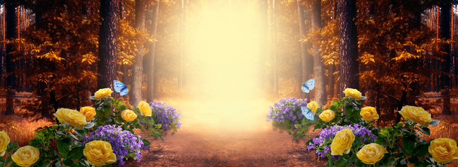 Fantasy fabulous wide panoramic photo background with autumnal pine tree forest, summer rose and bluebell campanula flower bush, flying blue butterfly and mysterious foggy trail road with copy space