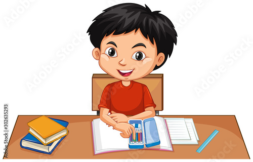 One happy boy doing homework on desk