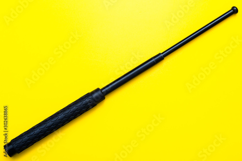 Black telescopic expandable baton / truncheon isolated photo