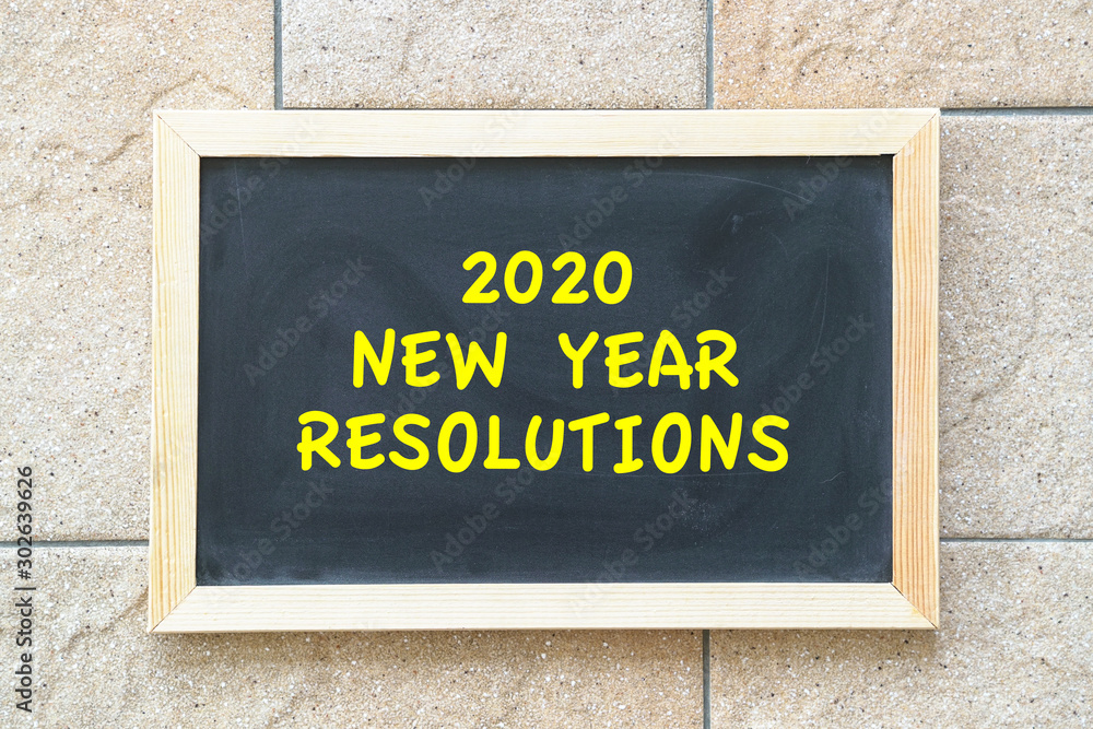 2020 new year goal, plan, action text on black board. 2020 new year goal, plan, action text on black board.