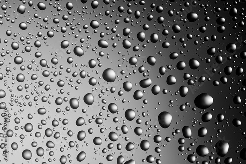 water drops on glass gradient background