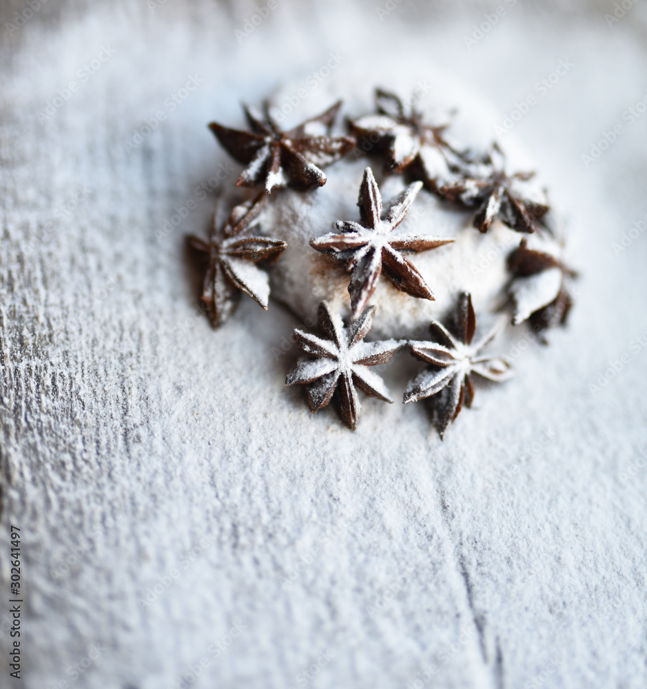 chocolate chip cookies in powdered sugar and star anise Christmas decor chocolate chip cookies in powdered sugar and star anise Christmas decor