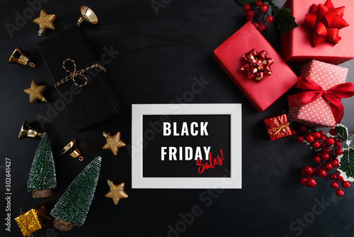 gift box with photo frame for Black Friday Sale concept on black background